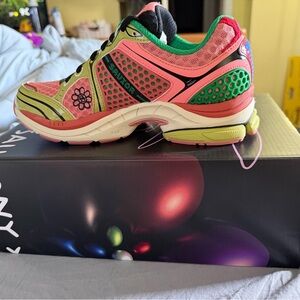Saucony Pink and Green Mesh Lace-Up Running Shoe with Yellow Accents